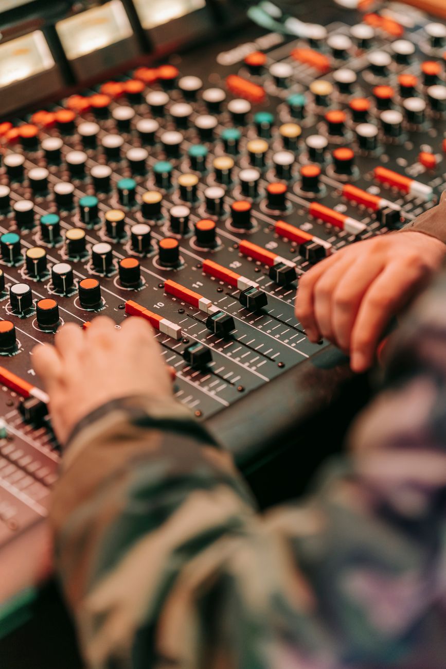 Close-up of a broadcast production mixing console